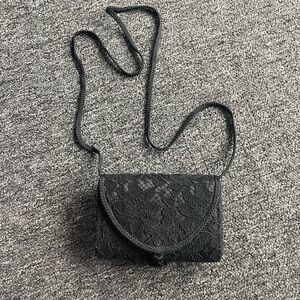 La Regale Black Clutch with Textured Finish